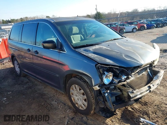 2010 Honda Odyssey LX with VIN 5FNRL3H28AB026712, listed as a IAAI auction lot 41281625 with 223,905 mi miles. Bid and sale history available at carsss.com. Image 1.