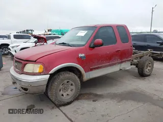 2003 Ford F-150 XL with VIN 2FTPX18LX3CA89961, listed as a IAAI auction lot 41901357 with 199,708 mi miles. Bid and sale history available at carsss.com. Image 2.