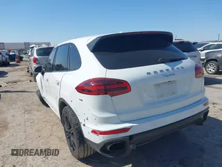 2016 Porsche Cayenne with VIN WP1AA2A29GLA04374, listed as a IAAI auction lot 41988374 with 144,716 mi miles. Bid and sale history available at carsss.com. Image 3.