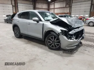 2018 Mazda CX-5 Grand Touring z VIN JM3KFBDM2J0314287, wystawiony jako IAAI lot #41929042 z przebiegiem 75 203 mil mil oraz . Historia ofert i sprzedaży dostępna na DreamBid. Obrazek 1.