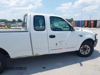 2003 Ford F-150 z VIN 2FTPX17L33CA59802, wystawiony jako IAAI lot #42669475 z przebiegiem 210 015 mil mil oraz . Historia ofert i sprzedaży dostępna na DreamBid. Obrazek 13.