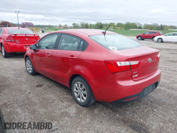 2012 Kia Rio LX with VIN KNADM4A30C6094000, listed as a IAAI auction lot 42059778 with 127,957 mi miles. Bid and sale history available at carsss.com. Image 3.