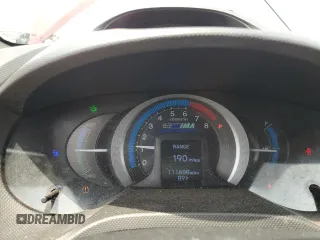 2011 Honda Insight with VIN JHMZE2H31BS008097, listed as a Copart auction lot 60780625 with 111,688 mi miles and Salvage title. Bid and sale history available at DreamBid. Image 9.