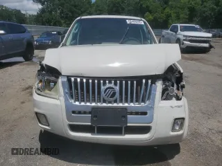 2009 Mercury Mariner z VIN 4M2CU81769KJ21980, wystawiony jako Copart lot #58489295 z przebiegiem 281 640 mil mil oraz Szkody całkowita. Historia ofert i sprzedaży dostępna na DreamBid. Obrazek 5.