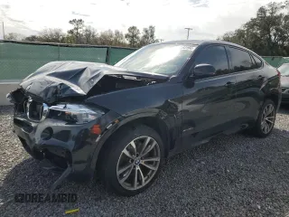 2016 BMW X6 xDrive50i with VIN 5UXKU6C50G0R33915, listed as a Copart auction lot 42183104 with 121,075 mi miles. Bid and sale history available at carsss.com. Image 1.