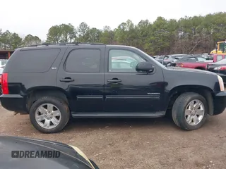 2012 GMC Yukon SLT with VIN 1GKS1CE09CR141878, listed as a IAAI auction lot 41552512 with 204,253 mi miles. Bid and sale history available at carsss.com. Image 13.
