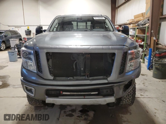 2016 Nissan Titan XD Platinum Reserve with VIN 1N6BA1F44GN503112, listed as a Copart auction lot 81138394 with 143,321 mi miles and Salvage Title. Bid and sale history available at carsss.com. Image 5.