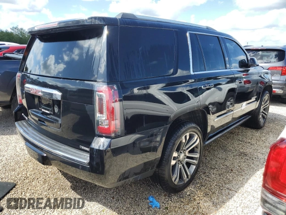 2020 GMC Yukon Denali with VIN 1GKS1CKJXLR181612, listed as a Copart auction lot 74451364 with 52,761 mi miles and Salvage Title. Bid and sale history available at carsss.com. Image 3.