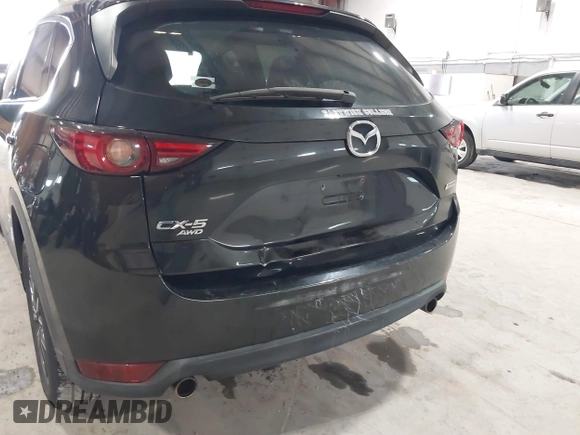 2017 Mazda CX-5 Grand Touring with VIN JM3KFBDL6H0143013, listed as a IAAI auction lot 41912979 with 122,890 mi miles. Bid and sale history available at carsss.com. Image 19.