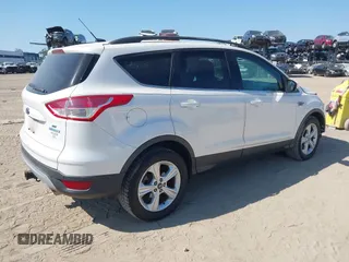 2014 Ford Escape SE with VIN 1FMCU0G94EUA35464, listed as a IAAI auction lot 42046944 with 88,504 mi miles. Bid and sale history available at carsss.com. Image 4.