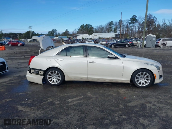 2014 Cadillac CTS Sedan RWD with VIN 1G6AP5SX2E0128760, listed as a IAAI auction lot 41719528 with 101,916 mi miles. Bid and sale history available at carsss.com. Image 14.