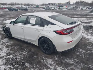 2023 Honda Civic Sport z VIN 19XFL2H89PE008381, wystawiony jako IAAI lot #41443683 z przebiegiem Nie podano mil oraz . Historia ofert i sprzedaży dostępna na DreamBid. Obrazek 3.