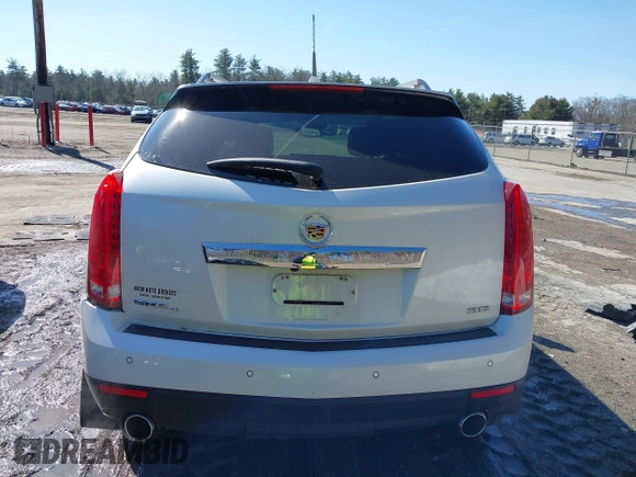 2014 Cadillac SRX Performance Collection with VIN 3GYFNFE30ES586713, listed as a IAAI auction lot 41791356 with 74,927 mi miles and . Bid and sale history available at DreamBid. Image 17.