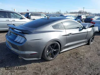 2021 Ford Mustang EcoBoost with VIN 1FA6P8TH4M5136345, listed as a IAAI auction lot 41503885 with 18,853 mi miles. Bid and sale history available at carsss.com. Image 4.