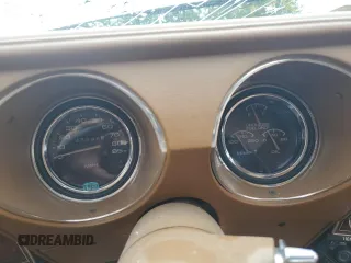1977 Oldsmobile Cutlass z VIN 3J57R7M186772, wystawiony jako Copart lot #70648914 z przebiegiem 43 326 mil mil oraz Szkody całkowita. Historia ofert i sprzedaży dostępna na DreamBid. Obrazek 9.