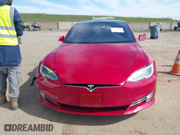 2018 Tesla Model S 75D with VIN 5YJSA1E26JF259651, listed as a IAAI auction lot 41690804 with Not Provided miles and . Bid and sale history available at DreamBid. Image 12.