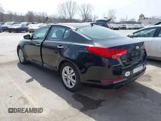 2013 Kia Optima EX z VIN 5XXGN4A7XDG198853, wystawiony jako IAAI lot #41807485 z przebiegiem 87 466 mil mil oraz . Historia ofert i sprzedaży dostępna na DreamBid. Obrazek 3.