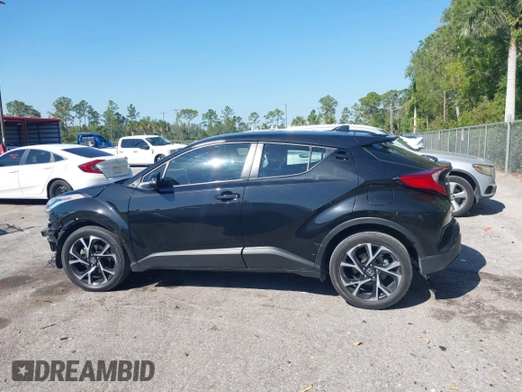 2021 Toyota C-HR LE with VIN NMTKHMBX7MR126165, listed as a IAAI auction lot 41848045 with 26,882 mi miles. Bid and sale history available at carsss.com. Image 14.