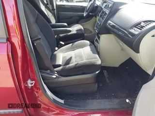 2014 Dodge Grand Caravan American Value with VIN 2C4RDGBG4ER366328, listed as a IAAI auction lot 42127426 with 69,358 mi miles and . Bid and sale history available at DreamBid. Image 5.