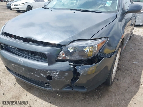 2006 Scion tC with VIN JTKDE177260081483, listed as a IAAI auction lot 42076072 with 156,556 mi miles. Bid and sale history available at carsss.com. Image 6.