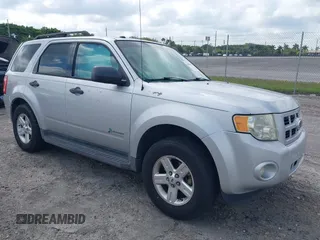 2011 Ford Escape Hybrid z VIN 1FMCU4K3XBKC60103, wystawiony jako IAAI lot #42048614 z przebiegiem 125 354 mil mil oraz . Historia ofert i sprzedaży dostępna na DreamBid. Obrazek 1.