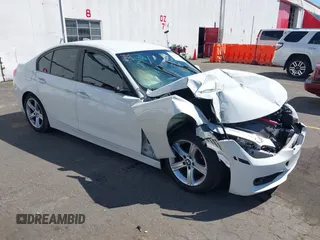 2014 BMW 3 Series 328i with VIN WBA3C1C56EK110898, listed as a IAAI auction lot 42207488 with Not provided miles and . Bid and sale history available at DreamBid. Image 1.
