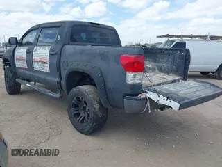 2013 Toyota Tundra 4WD Truck with VIN 5TFDW5F14DX279527, listed as a IAAI auction lot 41594899 with 212,973 mi miles. Bid and sale history available at carsss.com. Image 3.