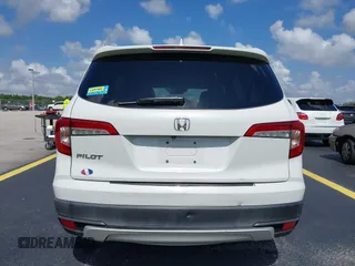 2020 Honda Pilot EX-L with VIN 5FNYF5H59LB028268, listed as a IAAI auction lot 42355620 with 107,033 mi miles and . Bid and sale history available at DreamBid. Image 16.
