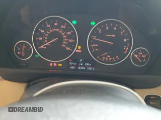 2014 BMW 3 Series 320i with VIN WBA3B1G5XENT00747, listed as a Copart auction lot 64737935 with 123,374 mi miles and Salvage title. Bid and sale history available at DreamBid. Image 9.