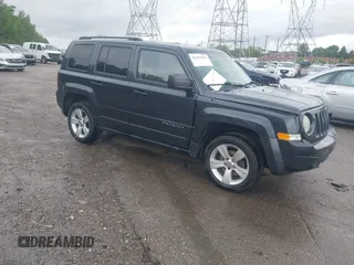 2014 Jeep Patriot Latitude z VIN 1C4NJRFB3ED892390, wystawiony jako IAAI lot #42257065 z przebiegiem 140 900 mil mil oraz . Historia ofert i sprzedaży dostępna na DreamBid. Obrazek 1.