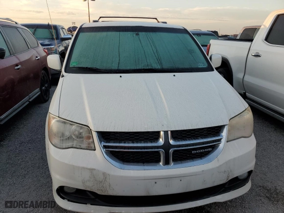 2012 Dodge Grand Caravan Crew with VIN 2C4RDGDG1CR172415, listed as a Copart auction lot 76197294 with 90,631 mi miles and Salvage Title. Bid and sale history available at carsss.com. Image 5.