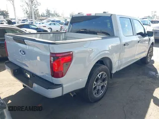 2024 Ford F-150 STX with VIN 1FTEW2KP7RFA29709, listed as a IAAI auction lot 41311395 with 5,883 mi miles and . Bid and sale history available at carsss.com. Image 4.