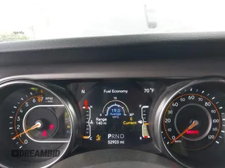 2021 Jeep Wrangler Unlimited Sport S z VIN 1C4HJXDG0MW788779, wystawiony jako IAAI lot #42137430 z przebiegiem 52 903 mil mil oraz . Historia ofert i sprzedaży dostępna na DreamBid. Obrazek 7.