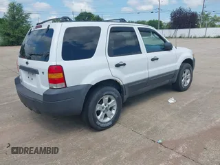 2006 Ford Escape XLT z VIN 1FMCU03106KA68555, wystawiony jako IAAI lot #42639823 z przebiegiem 147 320 mil mil oraz . Historia ofert i sprzedaży dostępna na DreamBid. Obrazek 4.