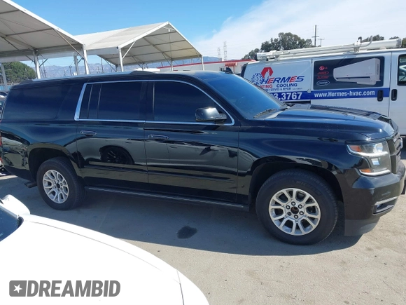 2019 Chevrolet Suburban LT with VIN 1GNSCJKCXKR332739, listed as a IAAI auction lot 41636530 with 104,997 mi miles and . Bid and sale history available at DreamBid. Image 13.