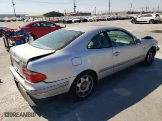 1999 Mercedes-Benz CLK-Class with VIN WDBLJ65G9XF065356, listed as a Copart auction lot 73586424 with 228,410 mi miles and Salvage Title. Bid and sale history available at carsss.com. Image 3.