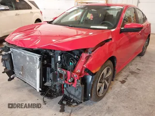 2020 Honda Civic LX with VIN 2HGFC2F63LH507310, listed as a IAAI auction lot 42180914 with 54,599 mi miles and . Bid and sale history available at DreamBid. Image 12.