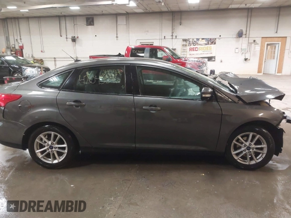 2016 Ford Focus SE with VIN 1FADP3F21GL247906, listed as a IAAI auction lot 42043546 with 124,532 mi miles and . Bid and sale history available at DreamBid. Image 13.