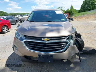2019 Chevrolet Equinox LT z VIN 2GNAXTEVXK6232662, wystawiony jako IAAI lot #42331522 z przebiegiem 92 090 mil mil oraz . Historia ofert i sprzedaży dostępna na DreamBid. Obrazek 12.