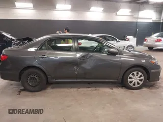 2011 Toyota Corolla L with VIN JTDBU4EE3BJ102060, listed as a IAAI auction lot 42140081 with 125,989 mi miles. Bid and sale history available at carsss.com. Image 13.