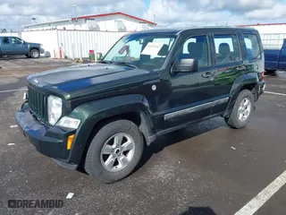 2011 Jeep Liberty Sport with VIN 1J4PN2GK9BW552545, listed as a IAAI auction lot 41815352 with 148,993 mi miles. Bid and sale history available at carsss.com. Image 2.