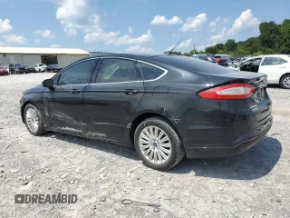 2013 Ford Fusion SE Hybrid with VIN 3FA6P0LU7DR288731, listed as a Copart auction lot 63902215 with 124,176 mi miles and Salvage title. Bid and sale history available at DreamBid. Image 2.