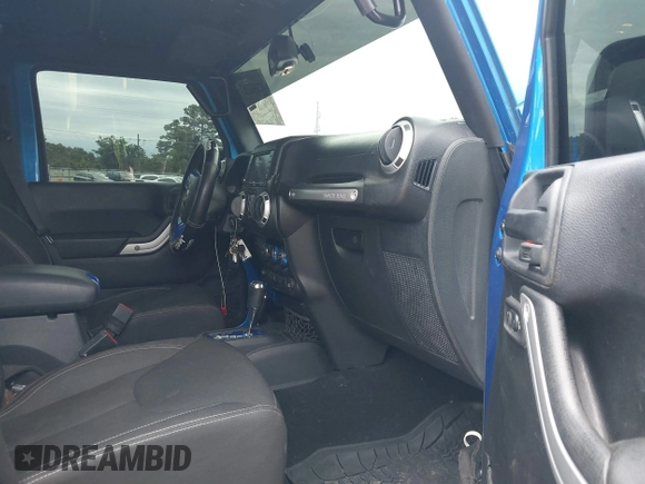2016 Jeep Wrangler Unlimited 75th Anniversary with VIN 1C4HJWEG0GL154418, listed as a IAAI auction lot 42192717 with 102,514 mi miles and . Bid and sale history available at DreamBid. Image 5.