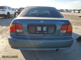 1999 Honda Civic DX with VIN 1HGEJ6629XL031952, listed as a Copart auction lot 41691105 with 66,909 mi miles and Salvage Title. Bid and sale history available at carsss.com. Image 6.