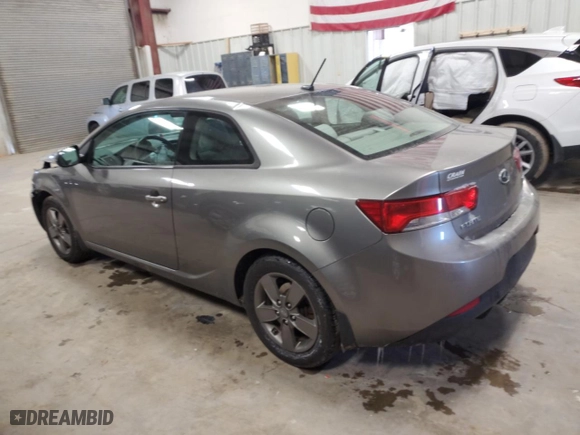 2012 Kia Forte Koup EX with VIN KNAFU6A2XC5504321, listed as a Copart auction lot 45986185 with 321,489 mi miles and Salvage Title. Bid and sale history available at carsss.com. Image 2.