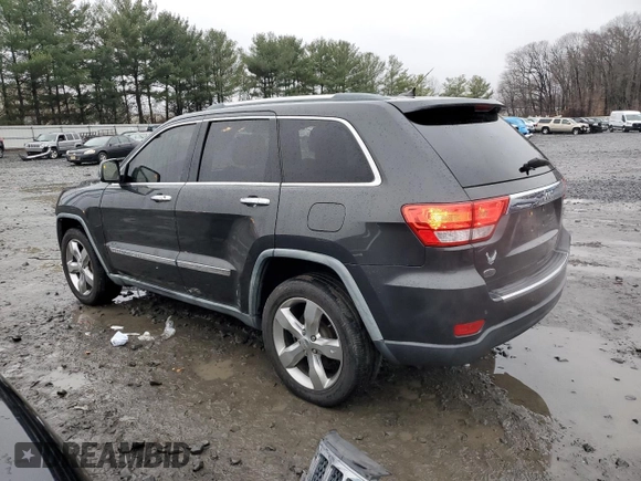 2011 Jeep Grand Cherokee Overland with VIN 1J4RS6GG5BC588562, listed as a Copart auction lot 84805424 with 150,030 mi miles and Salvage Title. Bid and sale history available at DreamBid. Image 2.