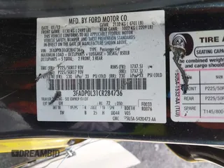 2012 Ford Fusion Hybrid with VIN 3FADP0L31CR284736, listed as a IAAI auction lot 42246142 with 384,612 mi miles and . Bid and sale history available at DreamBid. Image 9.