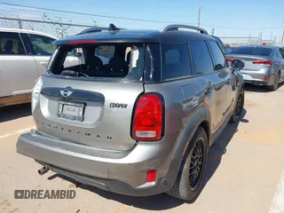 2018 MINI Countryman Cooper z VIN WMZYS7C3XJ3E08133, wystawiony jako IAAI lot #42623073 z przebiegiem 170 589 mil mil oraz . Historia ofert i sprzedaży dostępna na DreamBid. Obrazek 4.