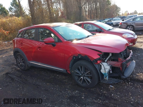 2017 Mazda CX-3 Grand Touring with VIN JM1DKFD77H0165528, listed as a IAAI auction lot 40942595 with 89,648 mi miles. Bid and sale history available at carsss.com. Image 13.