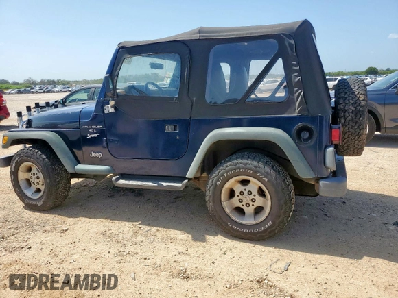 2000 Jeep Wrangler Sport with VIN 1J4FA49S9YP742414, listed as a Copart auction lot 61471065 with 139,572 mi miles and Clean title. Bid and sale history available at DreamBid. Image 2.